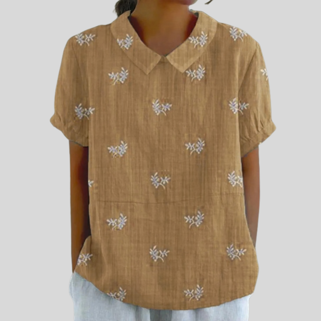 Top elegante con flores