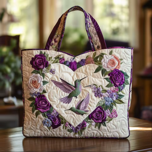 Bolso acolchado hecho a mano con colibrí sobre un corazón